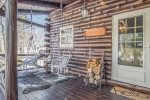 Relaxing covered porch with hammock chairs welcome you into the Lagom Sunset Retreat
